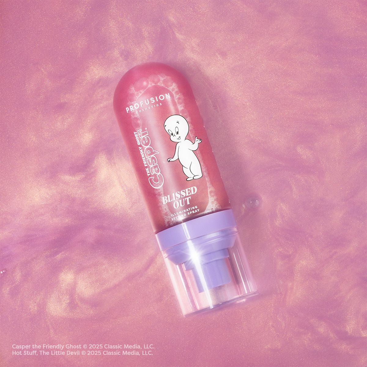 Profusion Cosmetics Blissed Out Illuminating Setting Spray for face, in a clear bottle with a spray nozzle.