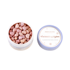 Profusion Cosmetics Frosted Snow Sparkle face powder puff set with twinkling lights design, soft and decorative for makeup application.