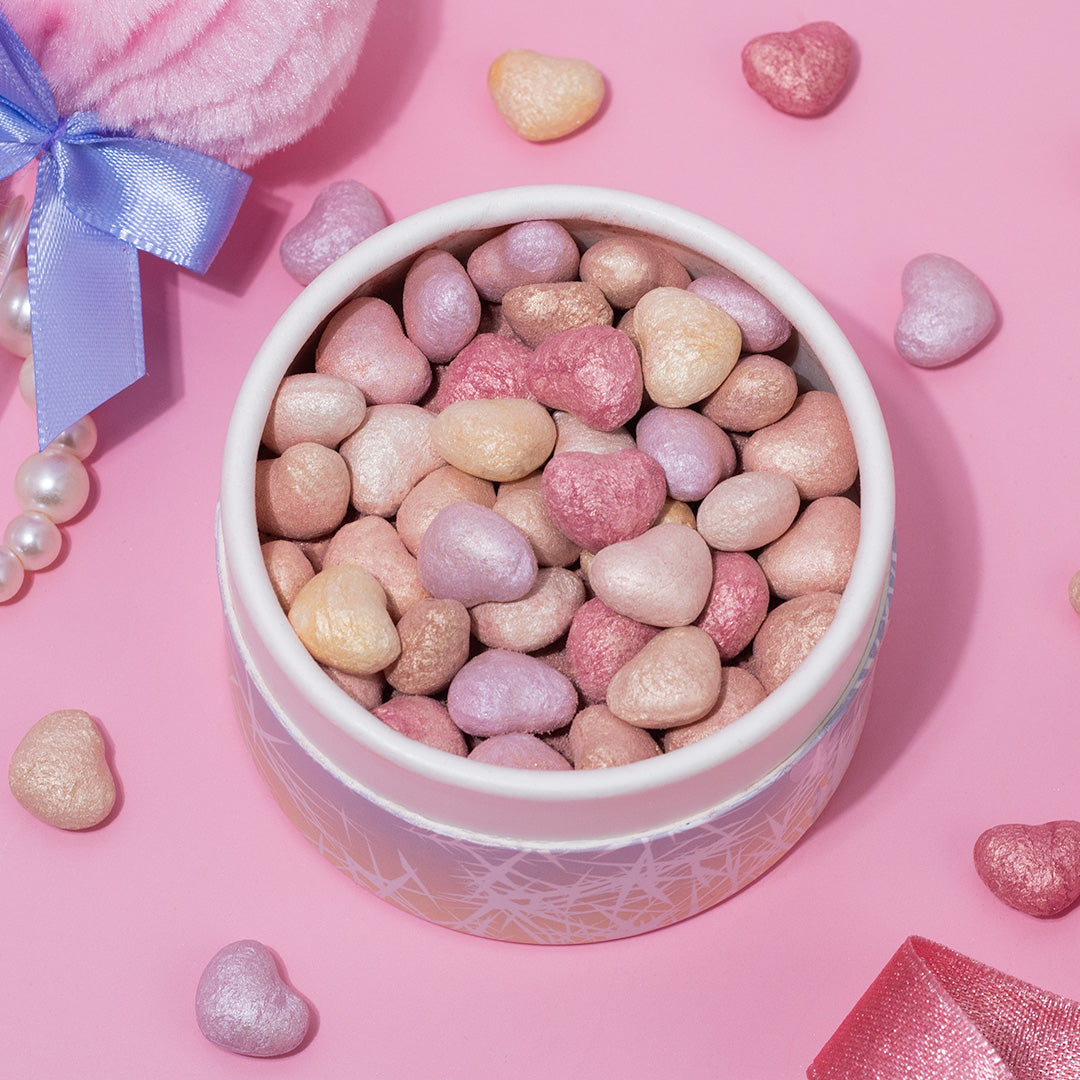 Profusion Cosmetics Frosted Snow Sparkle face powder puff set with shimmering, twinkling light-inspired design for a luminous look.