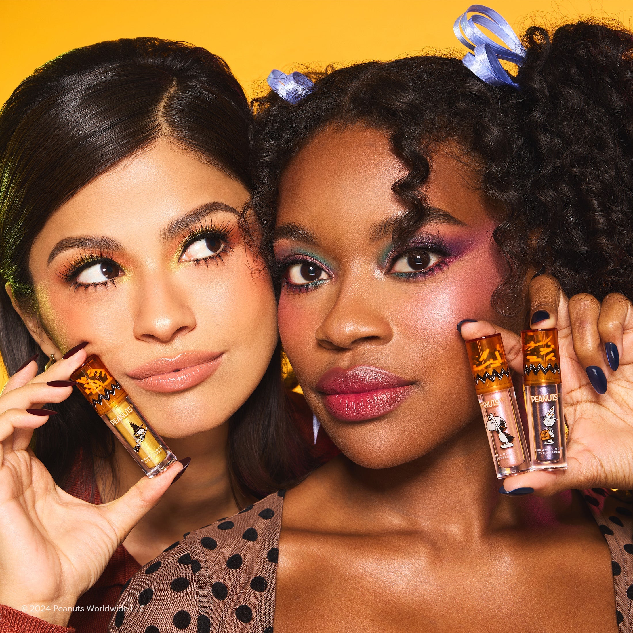 Profusion Cosmetics Peanuts Halloween Magical Wizard Chrome Liquid Topper set on face with shimmery, colorful makeup look.