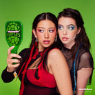 Profusion Cosmetics TMNT face handheld mirror with Teenage Mutant Ninja Turtles design and reflective surface.