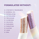 Profusion Cosmetics Jelly Beam Jelly Shimmer Stick on face, showcasing its glossy, shimmering texture for radiant skin.