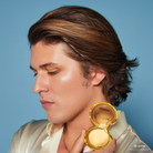 Profusion Cosmetics Harry Potter Golden Snitch highlighter with shimmering gold finish, perfect for a magical glow.