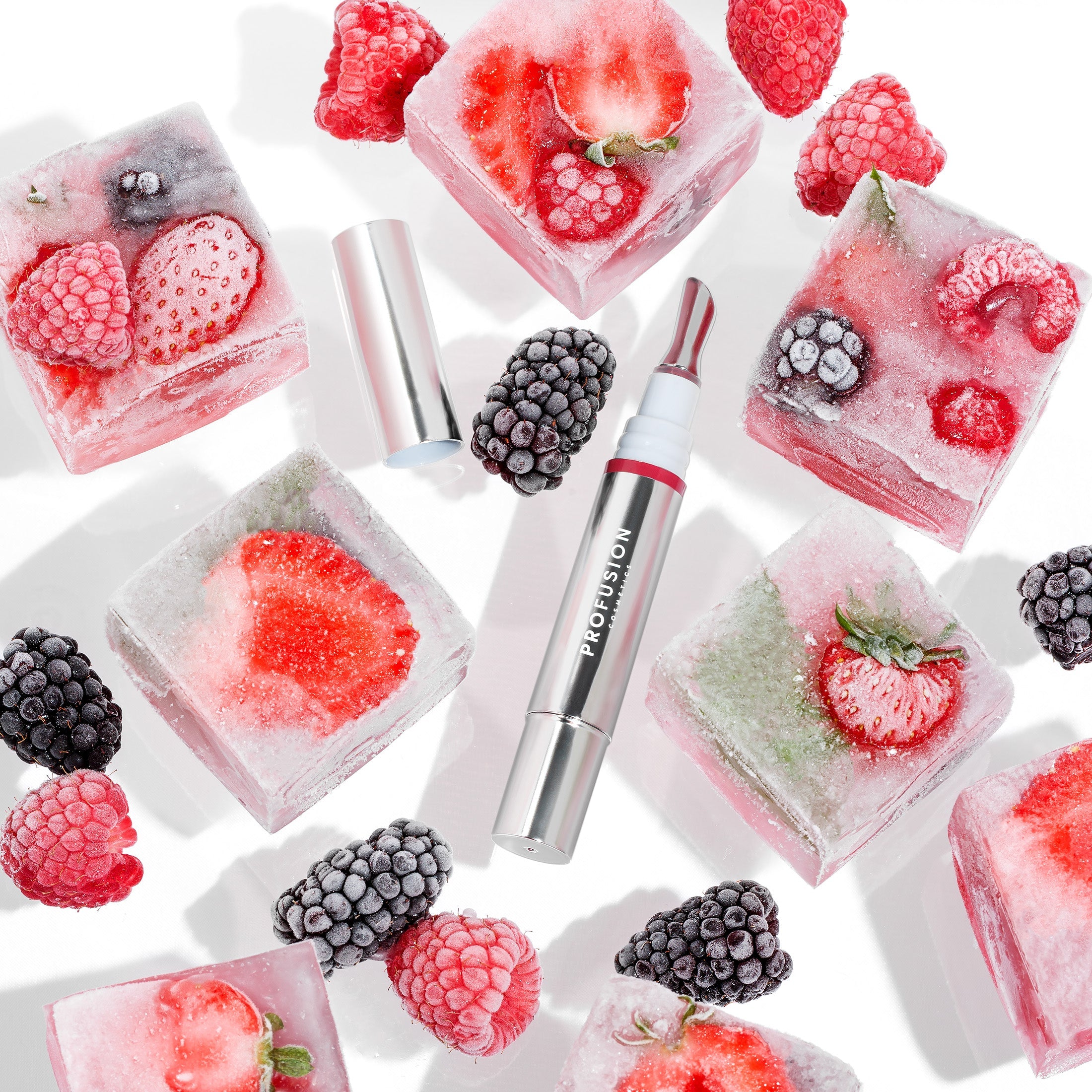 Profusion Cosmetics Frosted Kiss Cooling Plumping Lip Gloss in icy nude shade, glossy and smooth on the lips.