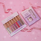 Profusion Cosmetics Frosted Snow Sparkle lip gloss set featuring frosted, shimmering lip glosses in a festive, sparkly packaging.