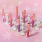 Profusion Cosmetics Frosted Snow Sparkle lip gloss set featuring shimmering, frosted finish lip glosses in various shades.
