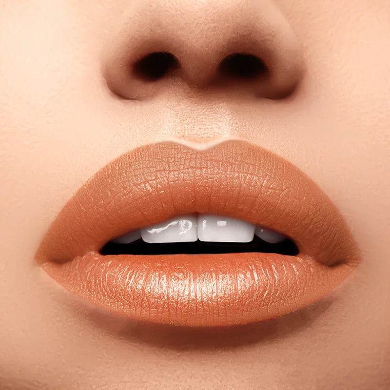 Profusion Cosmetics Perfect Pout Soft Matte Lip Tint on lips, showcasing a smooth, matte finish with a natural pink shade.