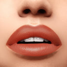 Profusion Cosmetics Perfect Pout Soft Matte Lip Tint on lips, showcasing a smooth, matte finish with a natural lip color.