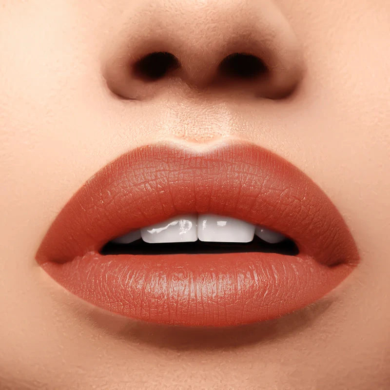 Profusion Cosmetics Perfect Pout Soft Matte Lip Tint on lips, showcasing a smooth, matte finish with a natural lip color.