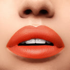 Profusion Cosmetics Perfect Pout Soft Matte Lip Tint applied on lips, showcasing a smooth, matte finish with a natural pink hue.