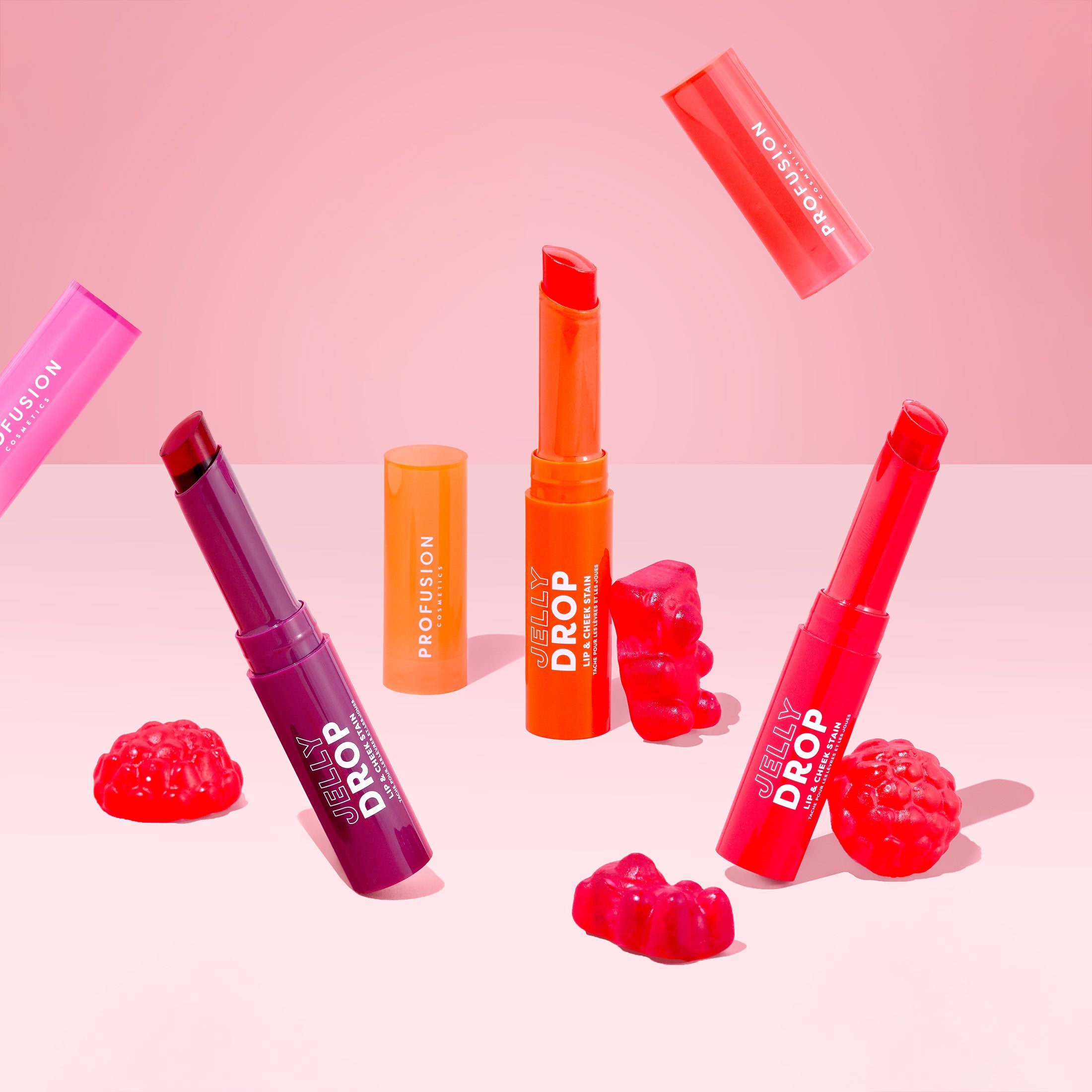 Profusion Cosmetics Jelly Drop Lip & Cheek Stain in Coral Crush, a versatile lip and cheek tint with a glossy finish.