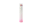 Profusion Cosmetics Glimmer Balm hydrating melting lip balm in coral, with a shiny, glossy finish on lips.