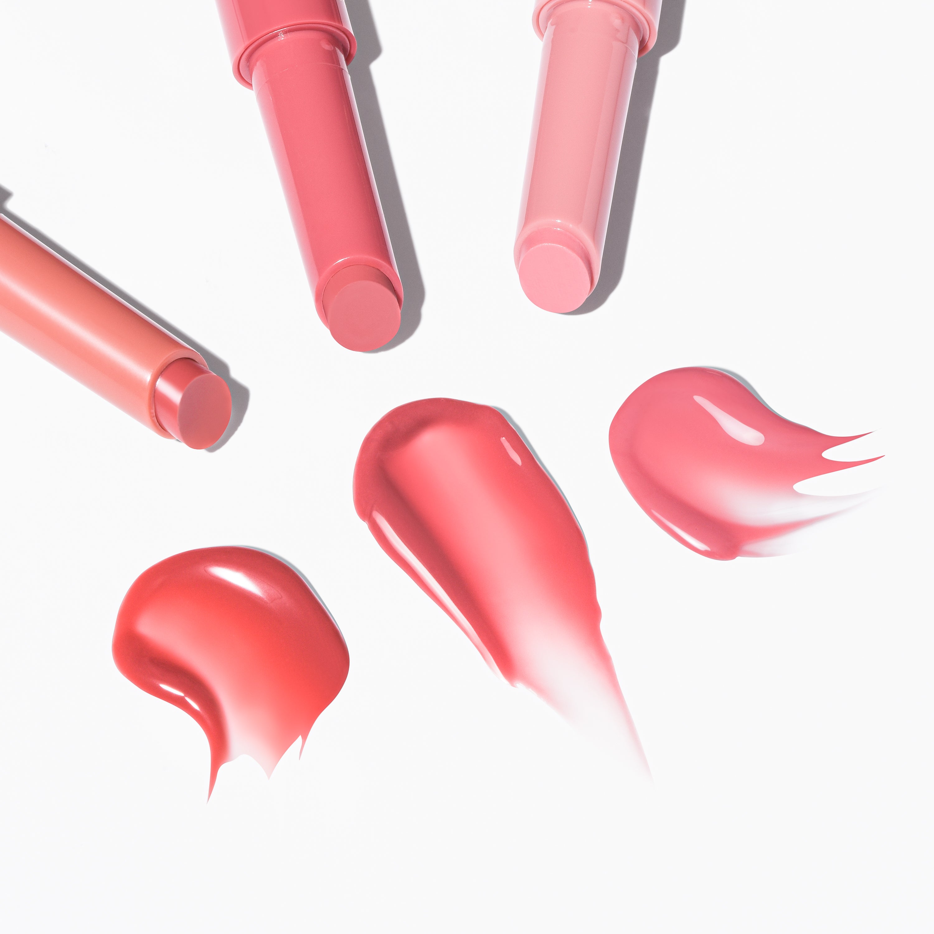 Profusion Cosmetics Dreamy Lip Plump in cozy nude, showing glossy lips with a smooth, plumped appearance.