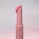 Profusion Cosmetics Dreamy Lip Plump in Cozy Nude, close-up of lips with glossy, plumped appearance and nude shade.