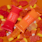Profusion Cosmetics Candy Crush Lip Oil Set featuring Peanuts Halloween-themed lip oils with fun, colorful packaging and lip care products.
