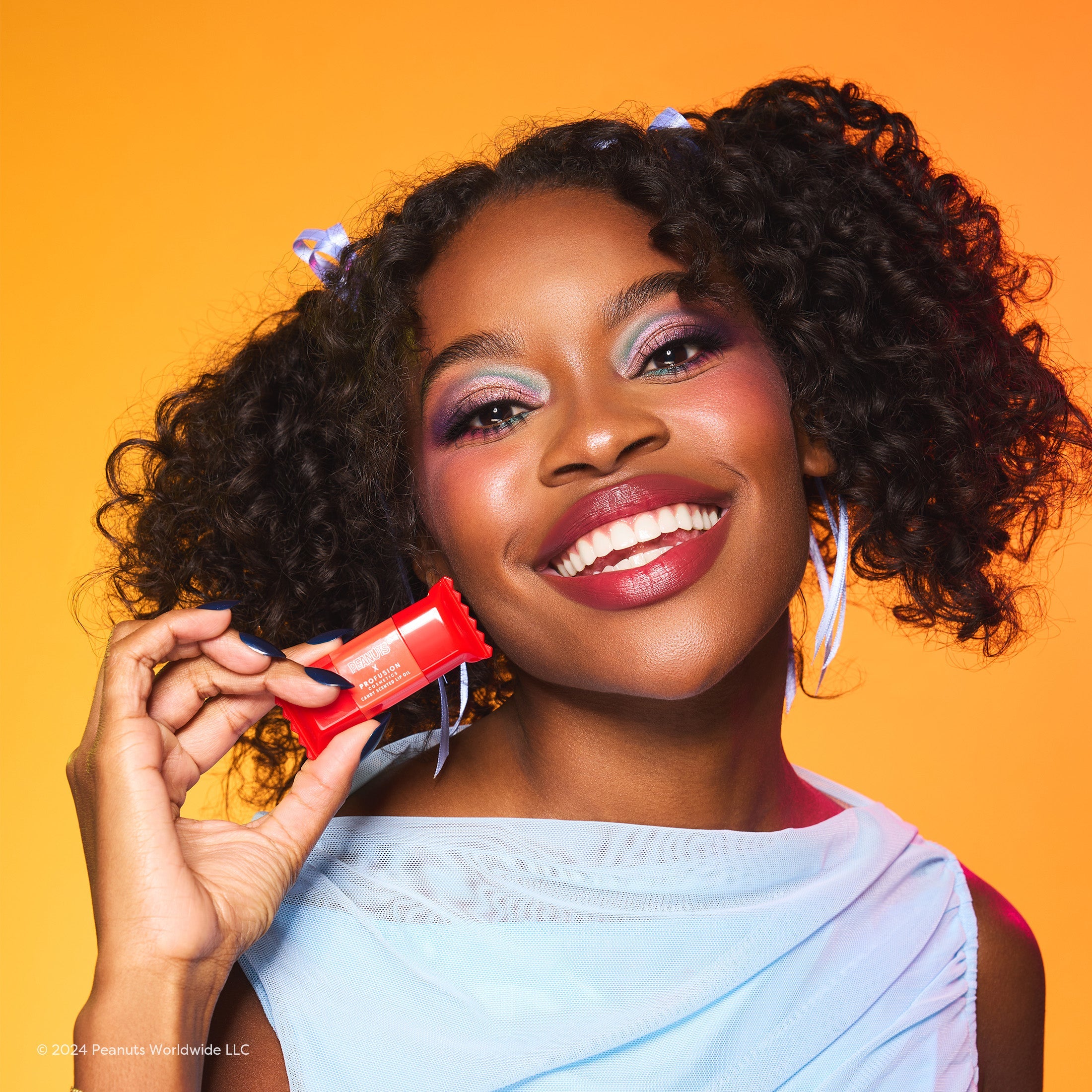 Profusion Cosmetics Candy Crush Lip Oil Set featuring Peanuts Halloween-themed lip oils with colorful packaging and fun Halloween designs.