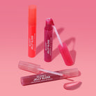 Profusion Cosmetics Glowy Jelly Gloss on lips with a glossy, nourishing guava-flavored finish, highlighting a vibrant, shiny lip look.