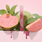 Profusion Cosmetics Glowy Jelly Gloss on lips with a shiny, nourishing pink jelly finish.