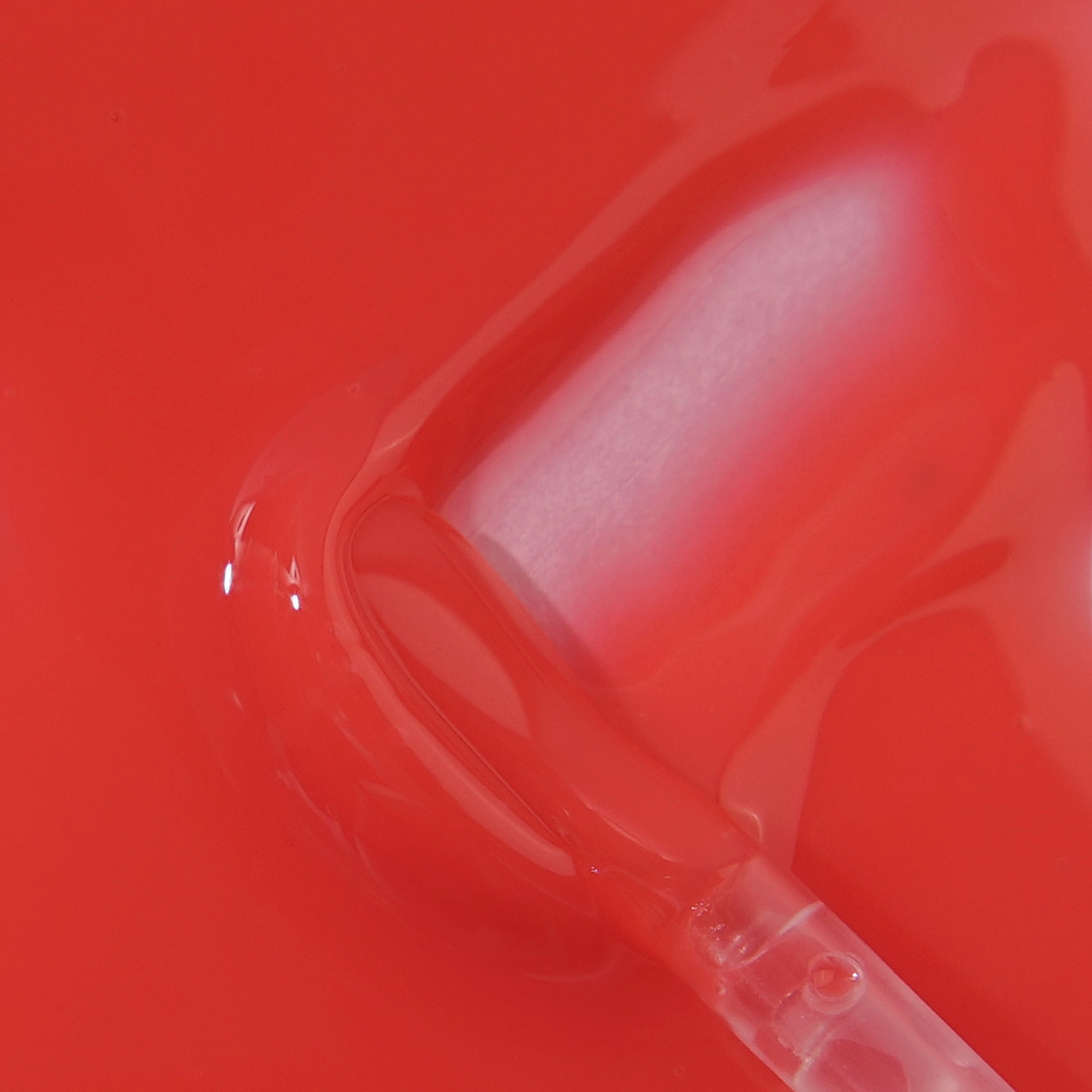 Profusion Cosmetics Glowy Jelly Gloss on lips with a glossy, nourishing pink finish in a close-up view.