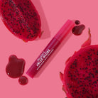 Profusion Cosmetics Glowy Jelly Gloss on lips with a shiny, nourishing guava-flavored finish, showcasing a glossy pink look.