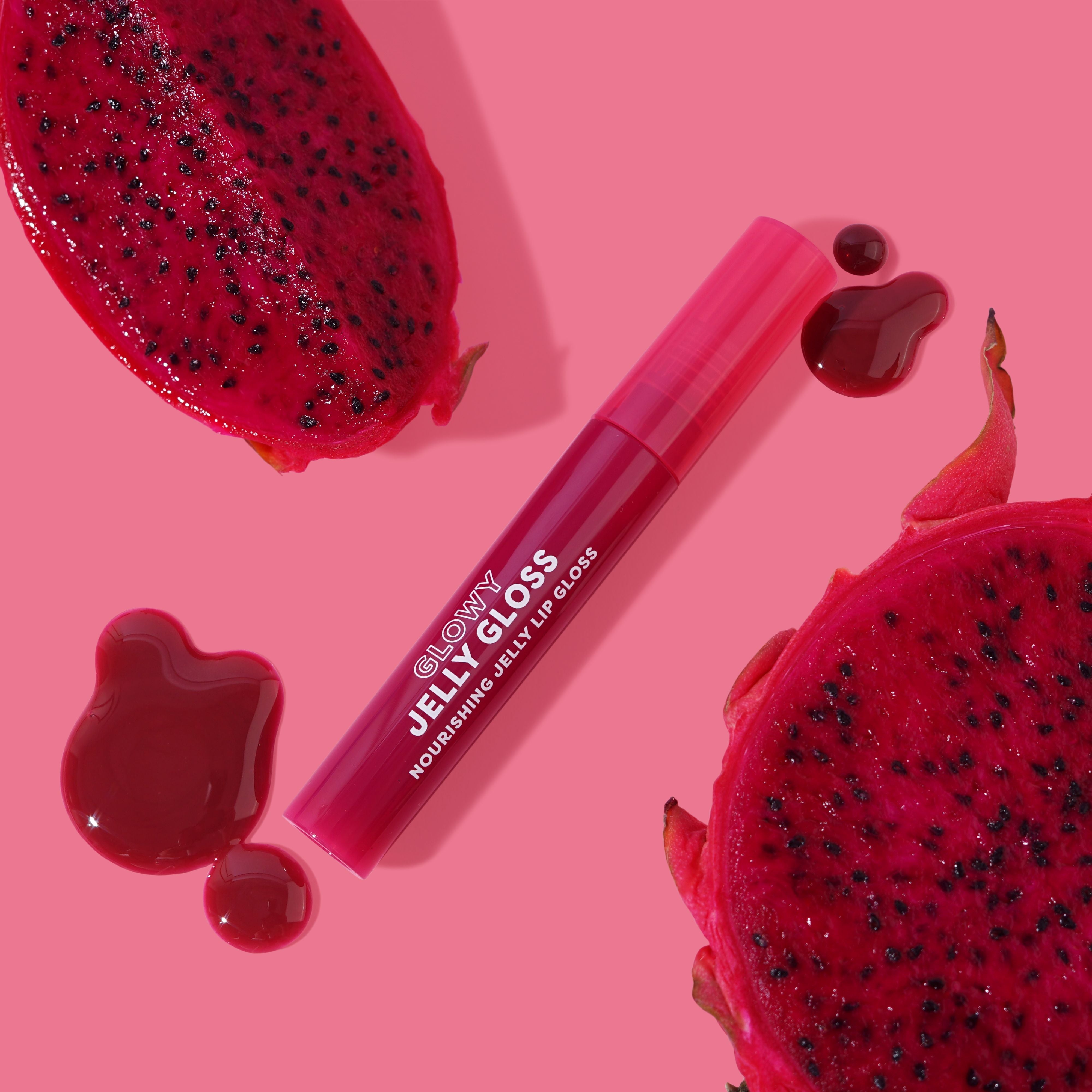 Profusion Cosmetics Glowy Jelly Gloss on lips with a shiny, nourishing guava-flavored finish, showcasing a glossy pink look.