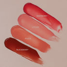 Profusion Cosmetics Lip Glaze Hydrating Lip Stain on lips with a glossy maple color and smooth finish.