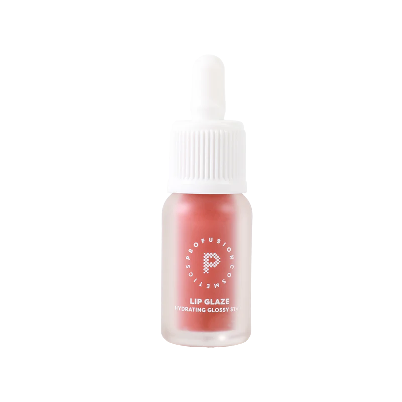 Profusion Cosmetics Lip Glaze Hydrating Lip Stain applied on lips with a glossy finish in a natural maple shade.