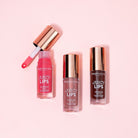 Profusion Cosmetics Juicy Lips in Radiant Rose, close-up of glossy pink lips with smooth texture and vibrant color.