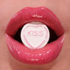 Profusion Cosmetics Juicy Lips in Radiant Rose, close-up of glossy pink lipstick on lips.