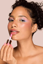 Profusion Cosmetics Juicy Lips in Radiant Rose, close-up of glossy pink lips with smooth texture and vibrant color.