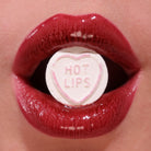 Profusion Cosmetics Juicy Lips with radiant rose shade, close-up of glossy lips with smooth texture and vibrant color.