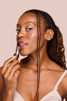 Profusion Cosmetics Juicy Lips in Radiant Rose, showing vibrant pink lip gloss with a glossy finish.