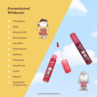 Profusion Cosmetics Peanuts 75th Blur Water Lip Tint on lips, showcasing a vibrant, glossy lip color with a smooth finish.