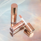 Profusion Cosmetics Radiant Glow Illuminating Liquid Highlighter in champagne shade, showcasing a luminous, liquid highlighter formula.