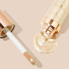 Profusion Cosmetics Radiant Glow Illuminating Liquid Highlighter in Champagne shade, showcasing a shimmering liquid highlighter for glowing skin.