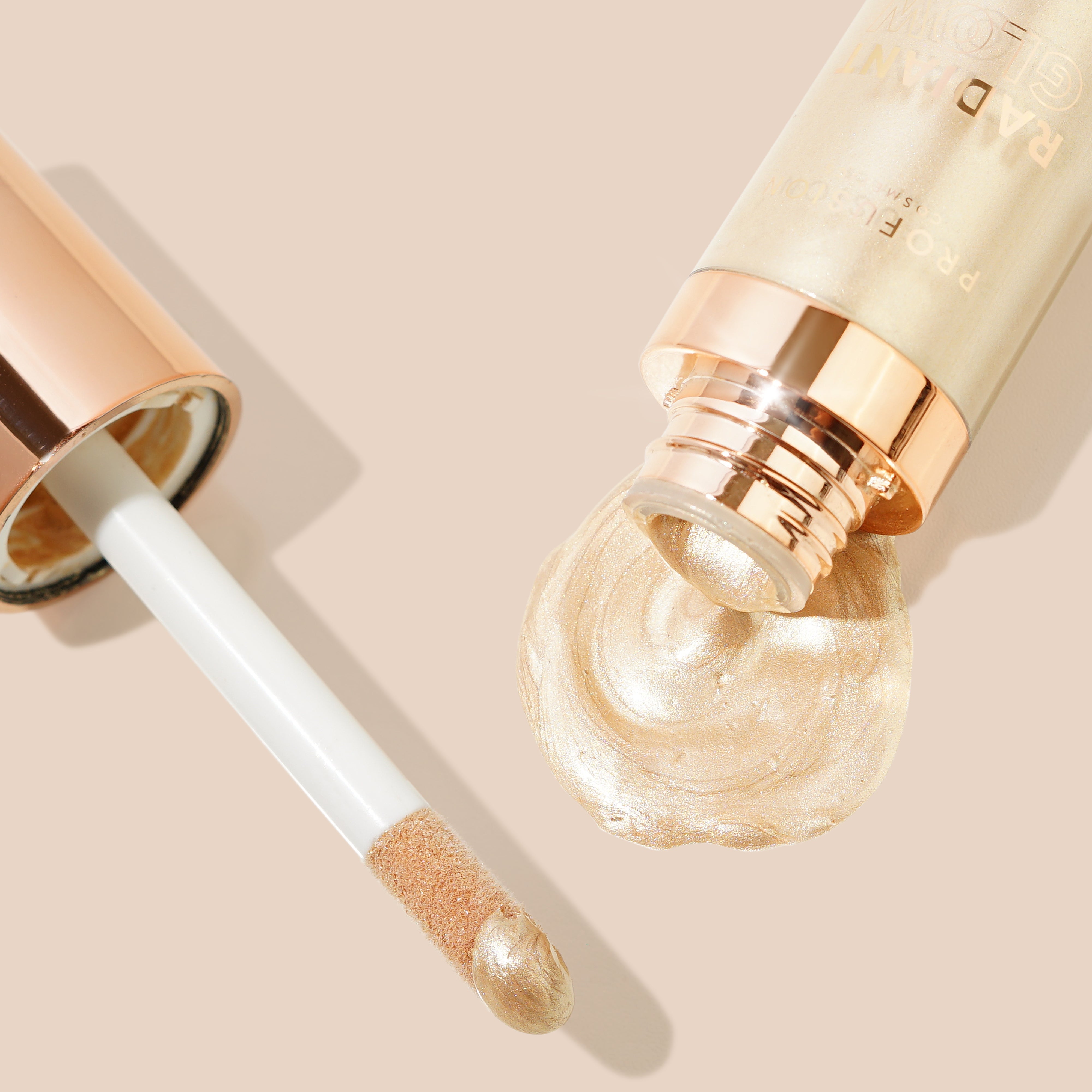 Profusion Cosmetics Radiant Glow Illuminating Liquid Highlighter in Champagne shade, showcasing a shimmering liquid highlighter for glowing skin.