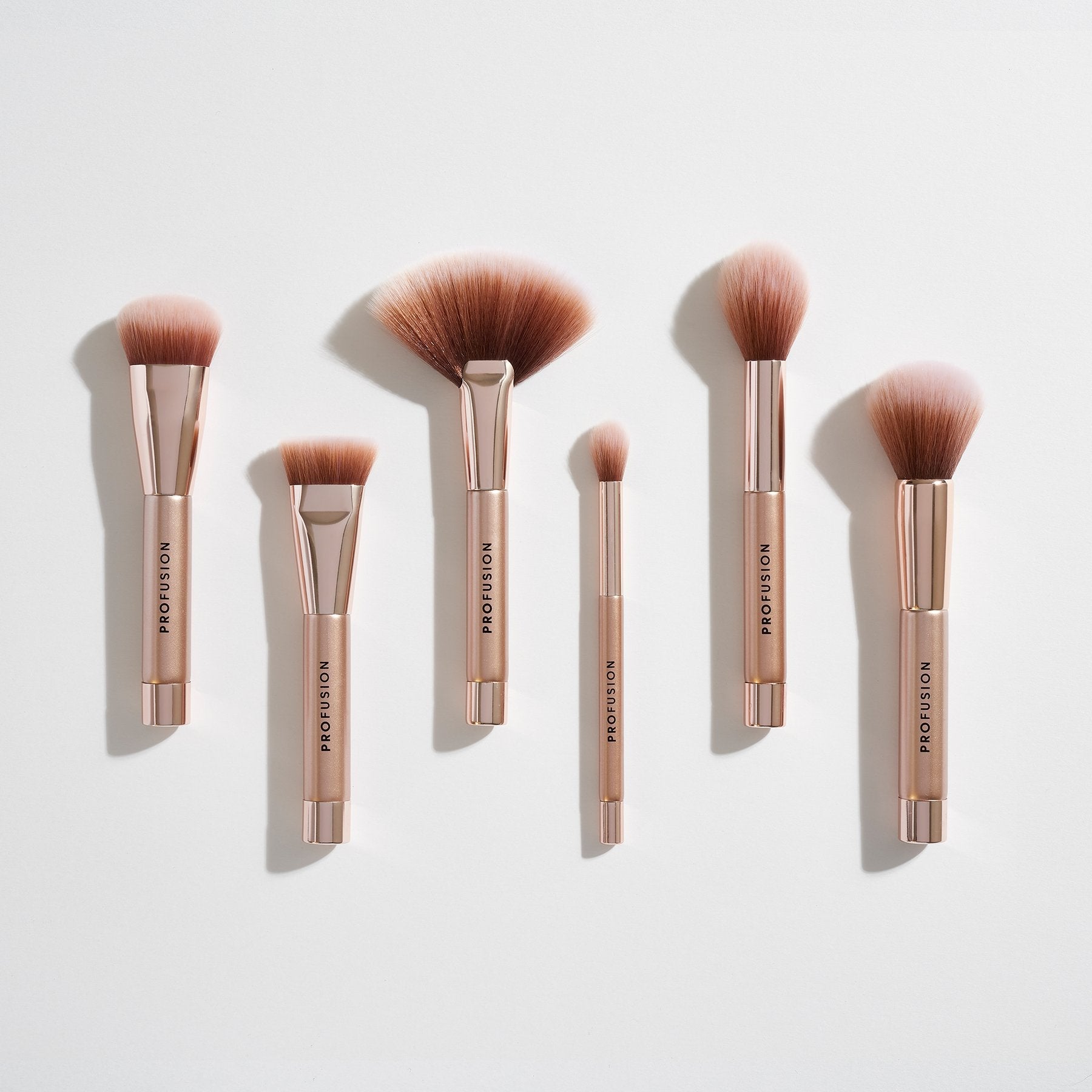 Profusion Cosmetics Magnetix Powder Brush for makeup application, with soft bristles and ergonomic handle.