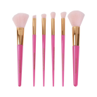 Set of six Profusion Cosmetics makeup brushes for face and eyes, including face and eye brush vault in holiday-themed packaging.