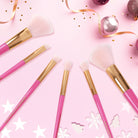 Set of six Profusion Cosmetics Sweet Holiday face and eye makeup brushes in a colorful vault display.
