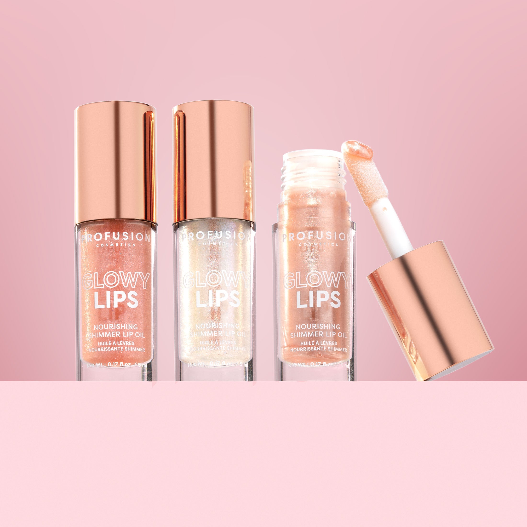 Profusion Cosmetics Glowy Lips Nourishing Shimmer Lip Oil with a shiny, moisturizing finish and a hint of shimmer on lips.