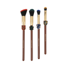 Harry Potter Holiday House Champions face and brush set by Profusion Cosmetics, featuring themed tools and colorful packaging.