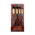 Harry Potter Holiday House Champions face and brush set by Profusion Cosmetics, featuring themed makeup tools with house colors and designs.