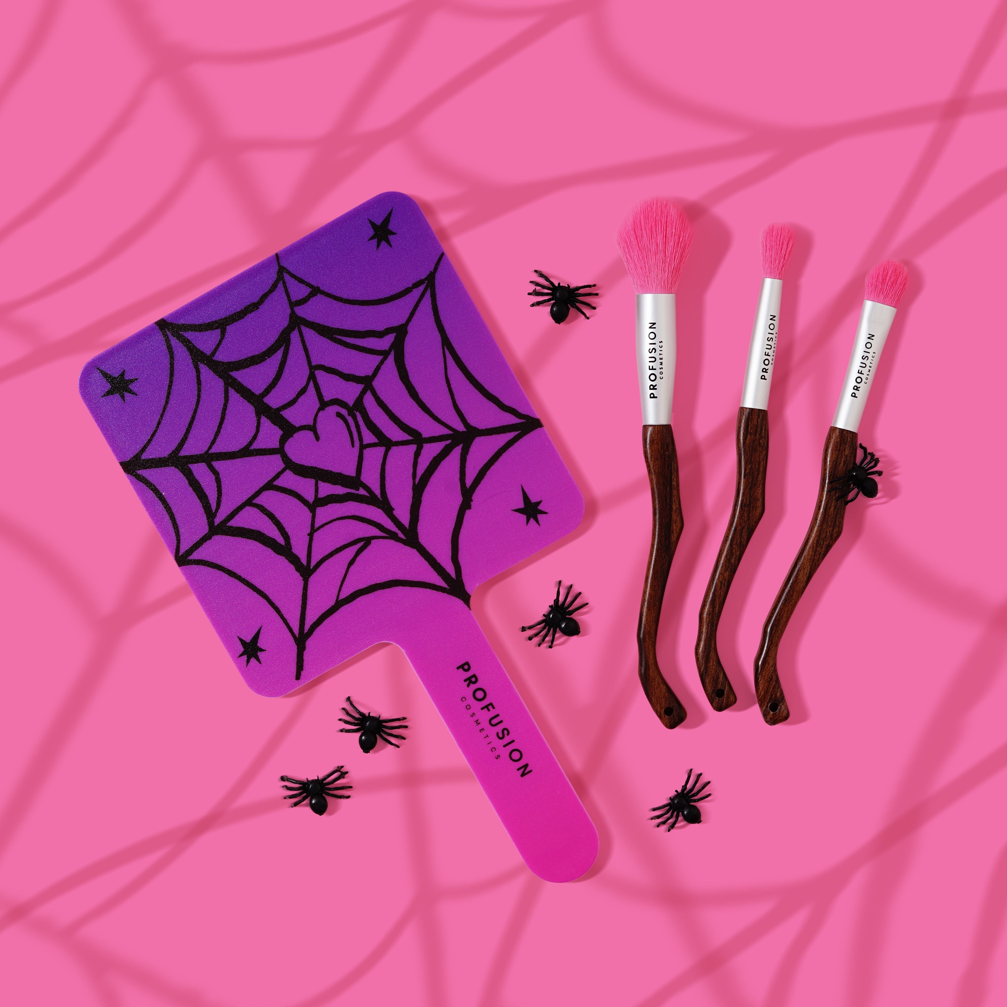 Handheld mirror from Profusion Cosmetics' Monster Bash collection featuring a spooky design and gothic style.