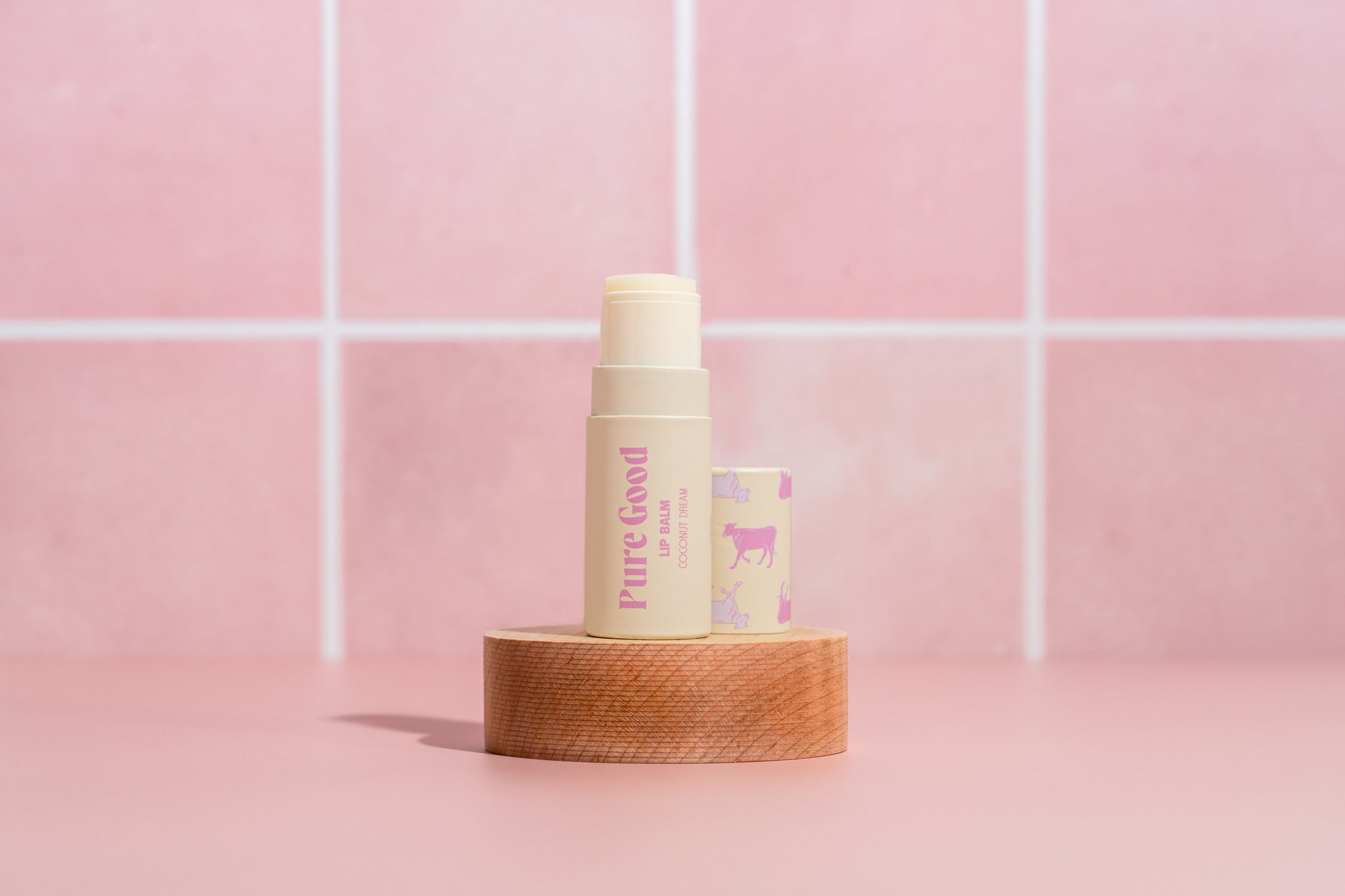 Pure Good LLC Tallow Lip Balm with citrus flavor, showing the natural lip balm stick in a close-up view.