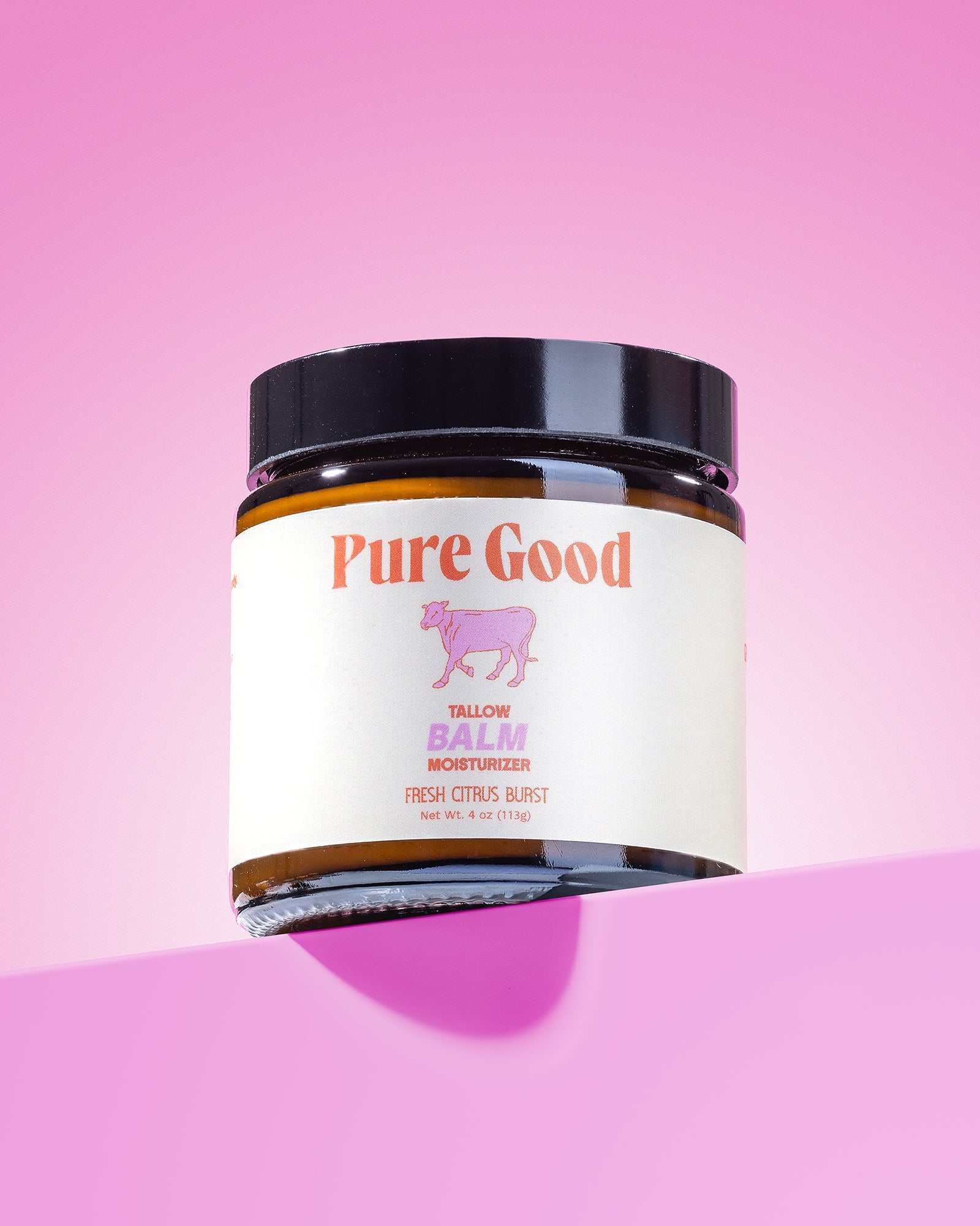 Whipped Citrus Burst Tallow Balm by Pure Good LLC, showing a jar of hydrating balm with fresh citrus ingredients.