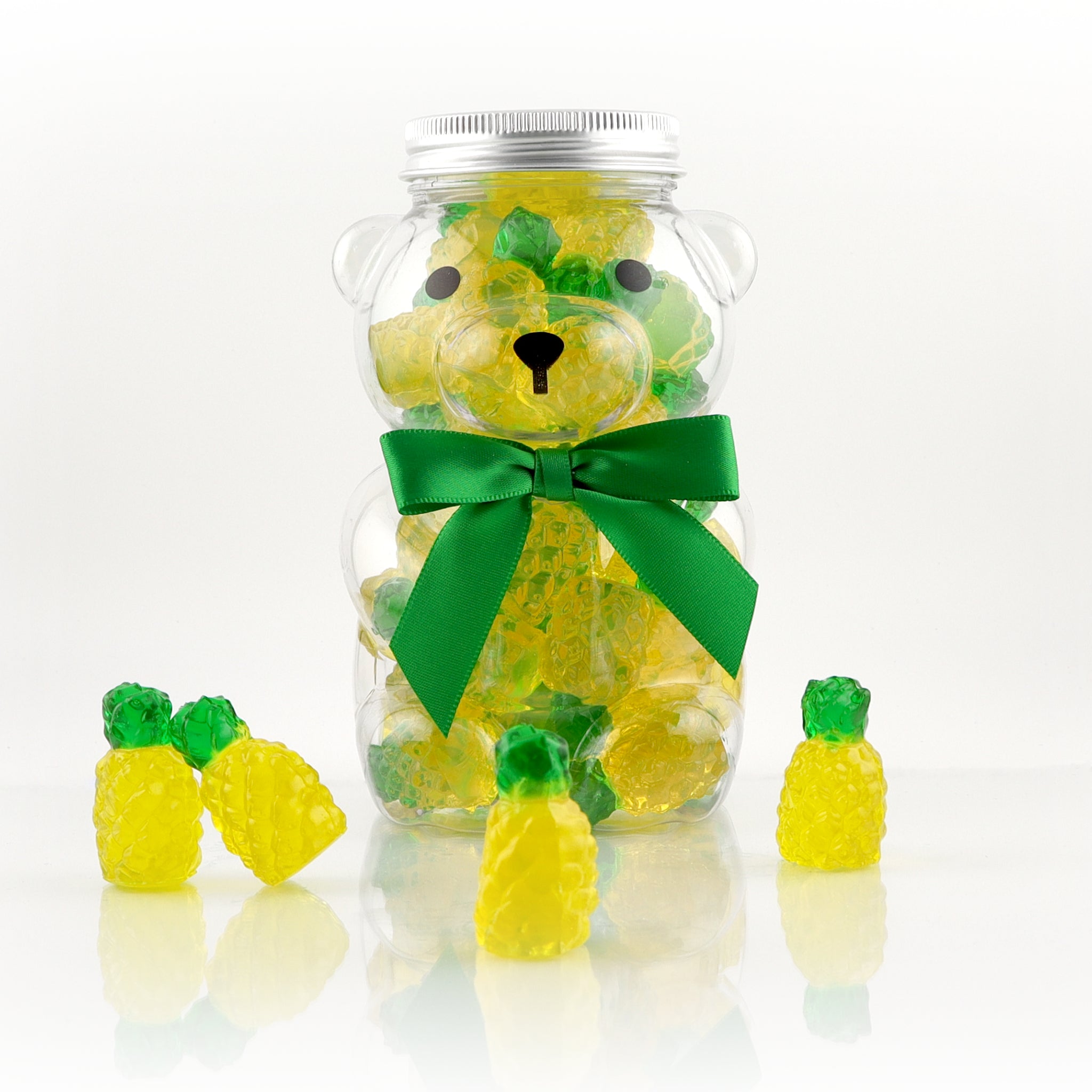 Summer Bear filled with 3-D gummy pineapples from Pure Sugar Candy, colorful candy and chocolate treat with playful bear shape.