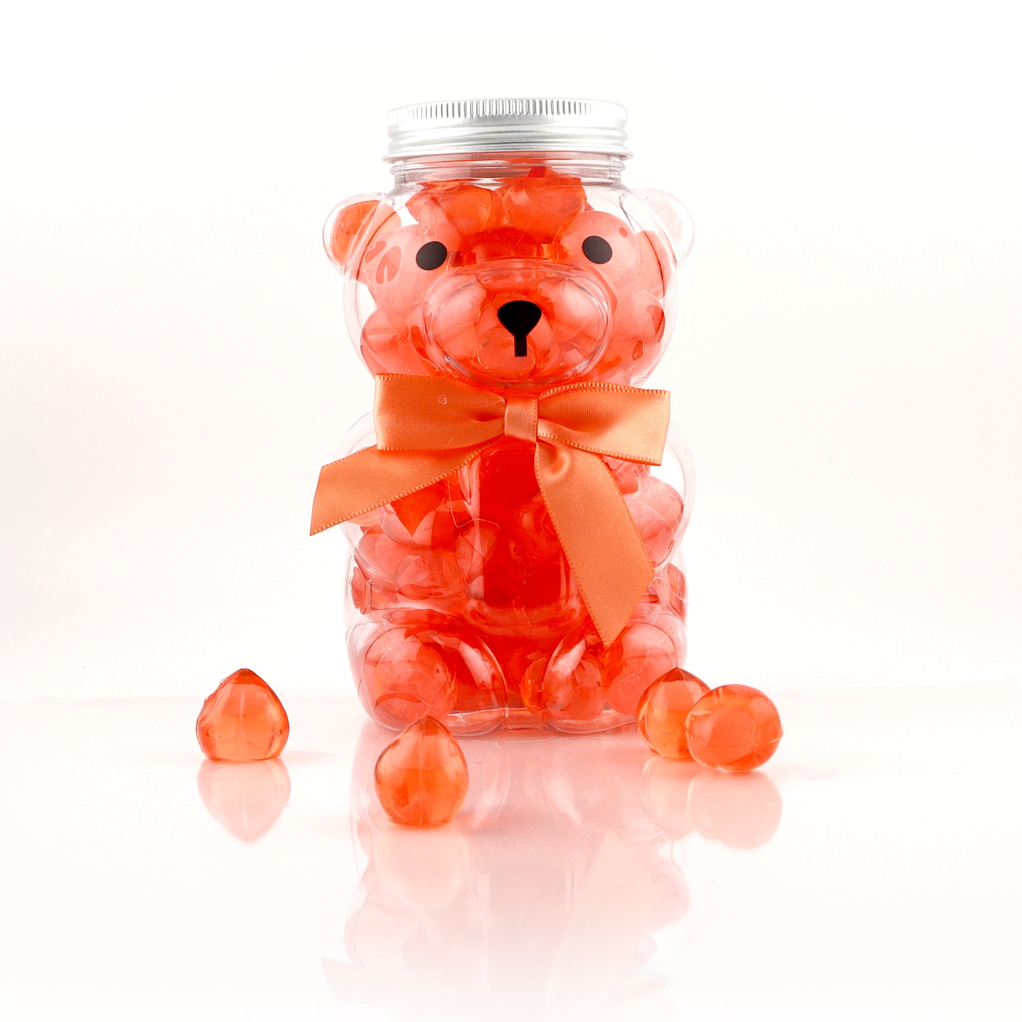 Summer Bear filled with 3-D Peach Gummies, colorful candy from Pure Sugar Candy, featuring a bear-shaped chocolate treat.