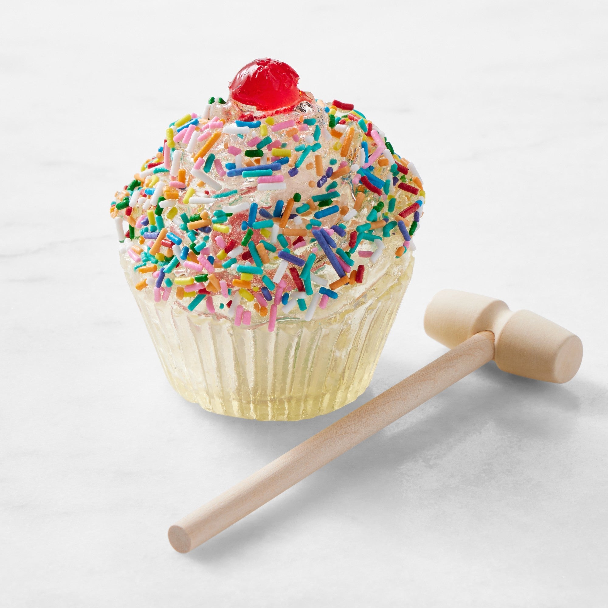 Hollow cupcake-shaped candy from Pure Sugar Candy filled with colorful cupcake gummies, detailed and sweet-looking.
