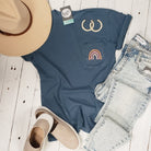 Unisex Rainbow Pocket Comfort Wash T-shirt with graphic design, casual style, from The Graphic Tee, featuring a rainbow pocket detail.