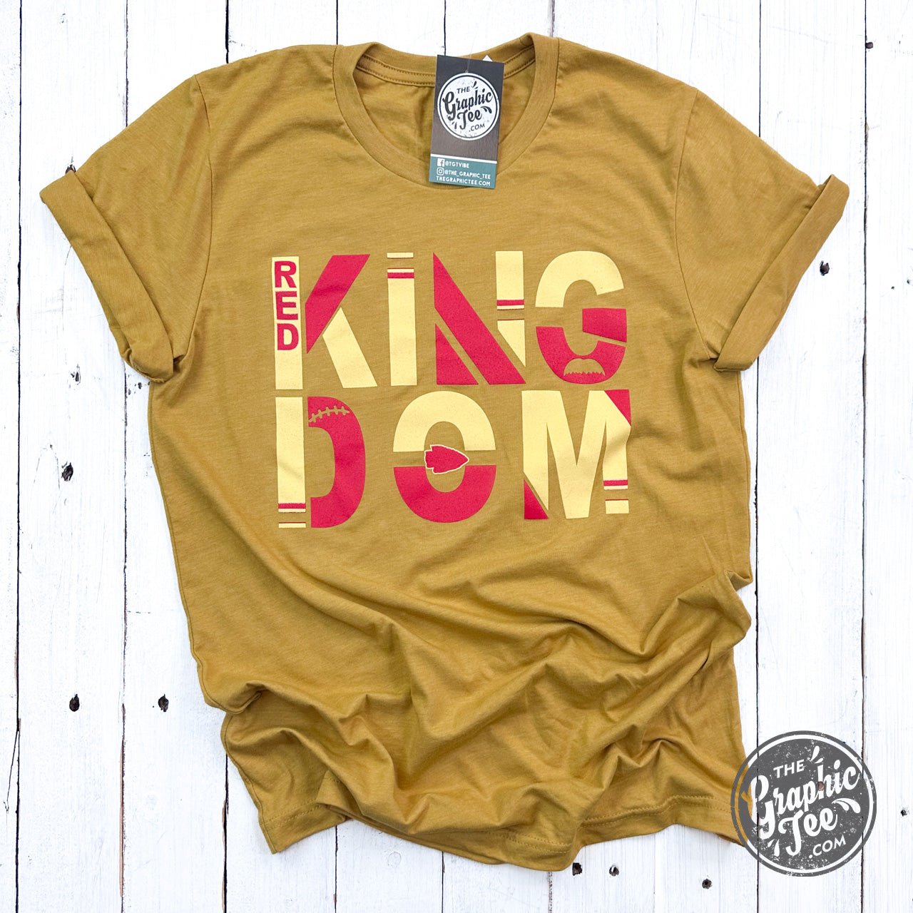 Red Kingdom Short Sleeve Tee from The Graphic Tee, featuring a vibrant graphic design on a red cotton t-shirt.
